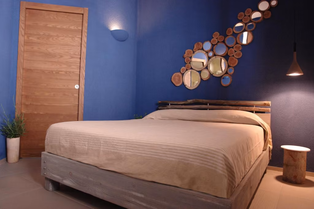 Camera tripla del B&B Sapore di Mare a Vasto Marina con letto e arredi curati